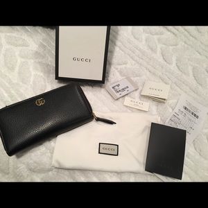 GUCCI GG Leather zip around wallet